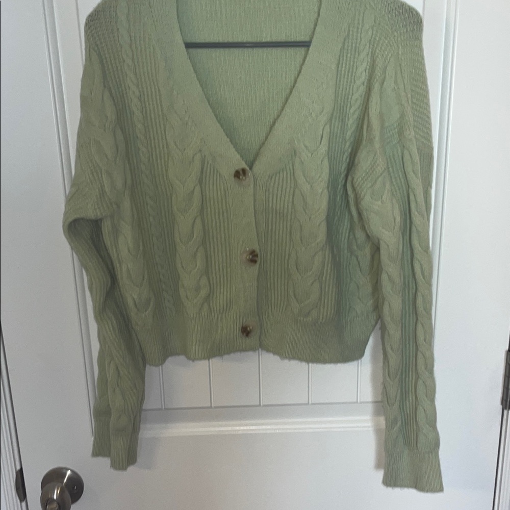 Light green button up cable knit cardigan